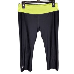 Under armour Women's cropped yoga pants fitted with yellow waistband size M